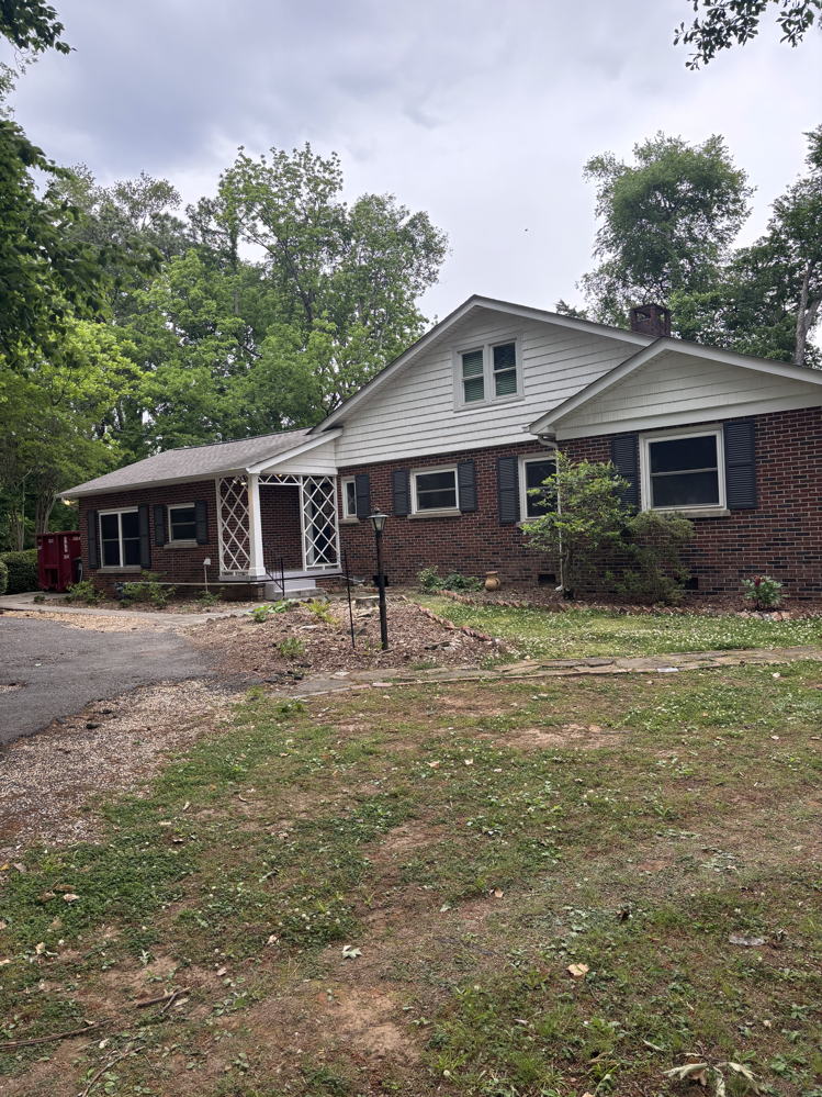After: cleaned-up Huntsville property following Dixieland Tree Service removal